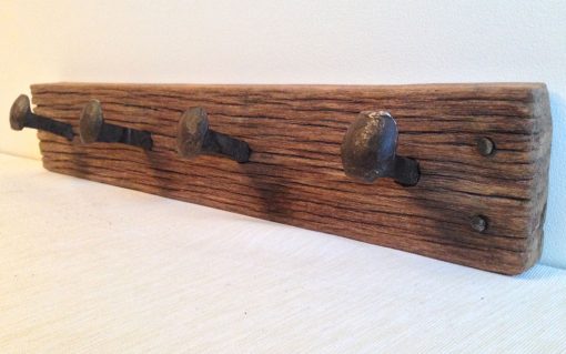 Keruing wood rustic coat rack with railway spike hangers