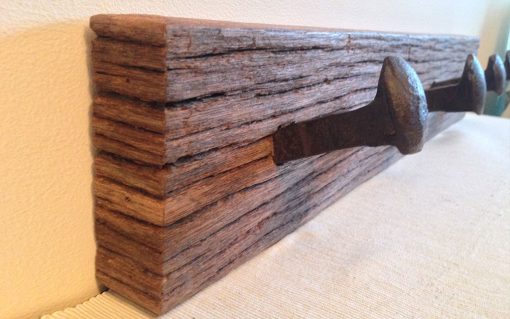 Keruing wood rustic coat rack with railway spike hangers - Image 4