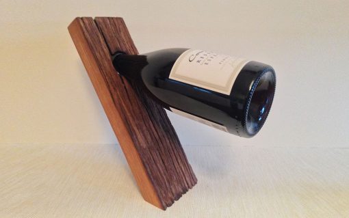 Self-balancing rustic oak wine holder